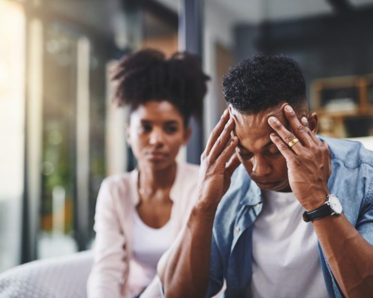 Couple in a Los Angeles attachment therapy session working on securing attachment. couple looks like they are arguing in therapy.