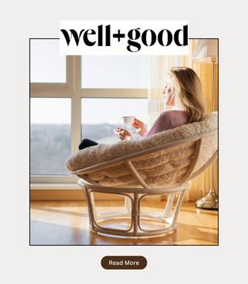 Photo showing a woman doing online therapy from a egg shaped chair in Los Angeles with the words "Well+Good" on it. Photo says "read here" to get access to Cheryl Groskopf's feature in the website, discussing attachment styles and how attachment impacts falling in love