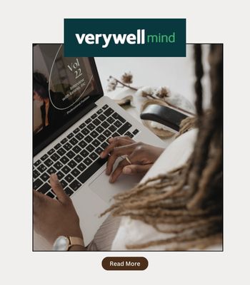 Photo showing a woman doing online therapy from her laptop, with the words "Verywell Mind" on it. Photo says "read here" to get access to Cheryl Groskopf's feature in the magazine, discussing attachment styles and friendships/relationsihps.