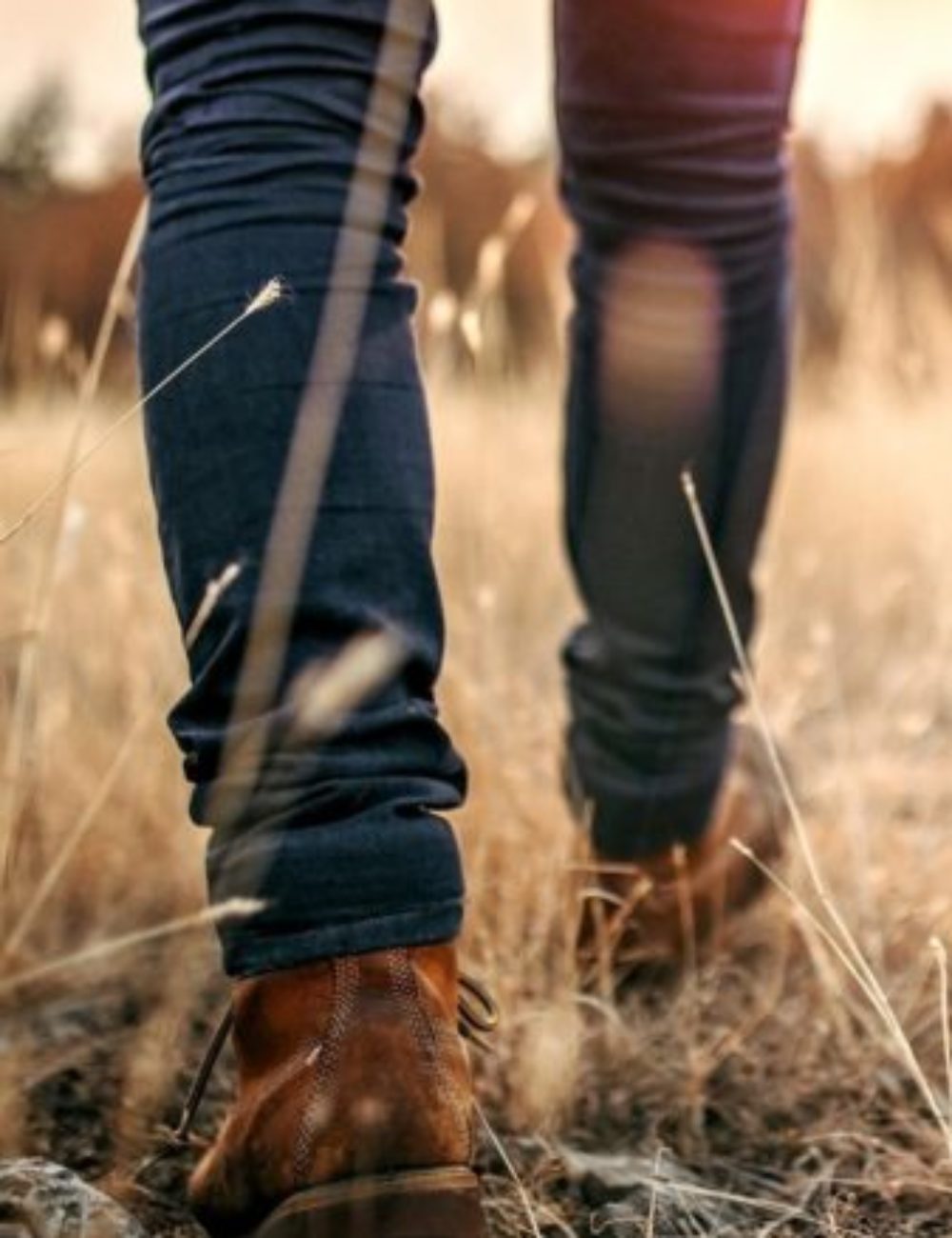 Man's legs walking to trauma therapy in Los Angeles. Feet on the ground in Los Angeles walking.