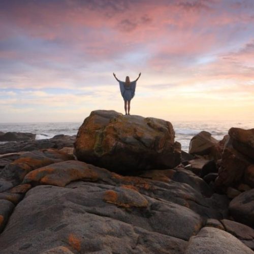 Adult on top of rock doing inner child healing therapy in los angeles