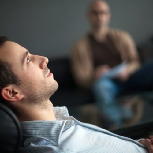 Man in a cozy and welcoming therapist office in Los Angeles for individuals seeking help with fearful avoidant attachment